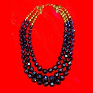 Vintage Art-Deco Triple Strand Black Beaded Necklace w/unique golden clasp.